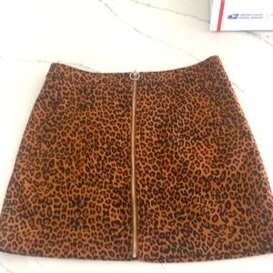 Woman’s leopard skirt